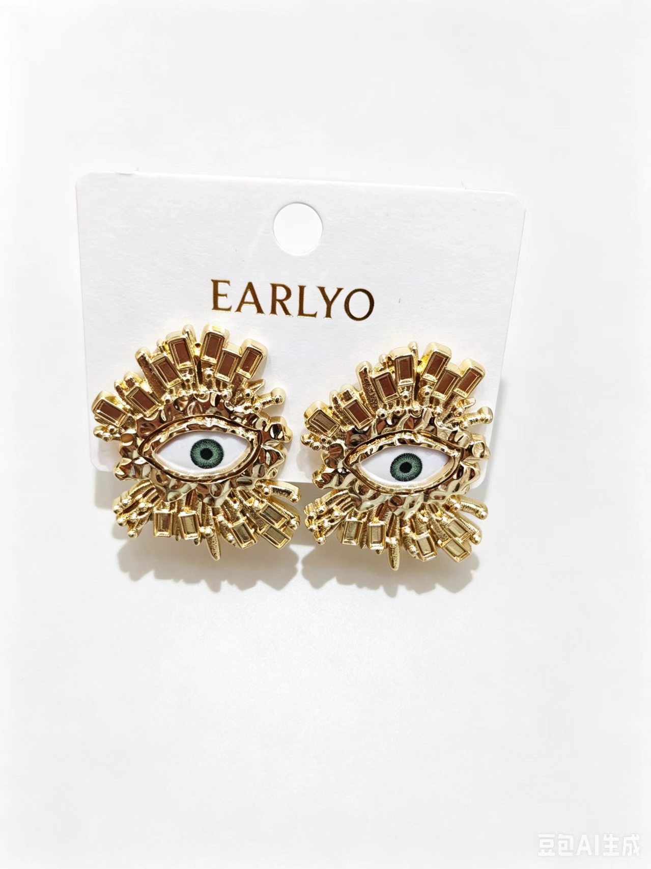 Evil eye stud earrings with green eye center and crystal surround, protective talisman jewelry