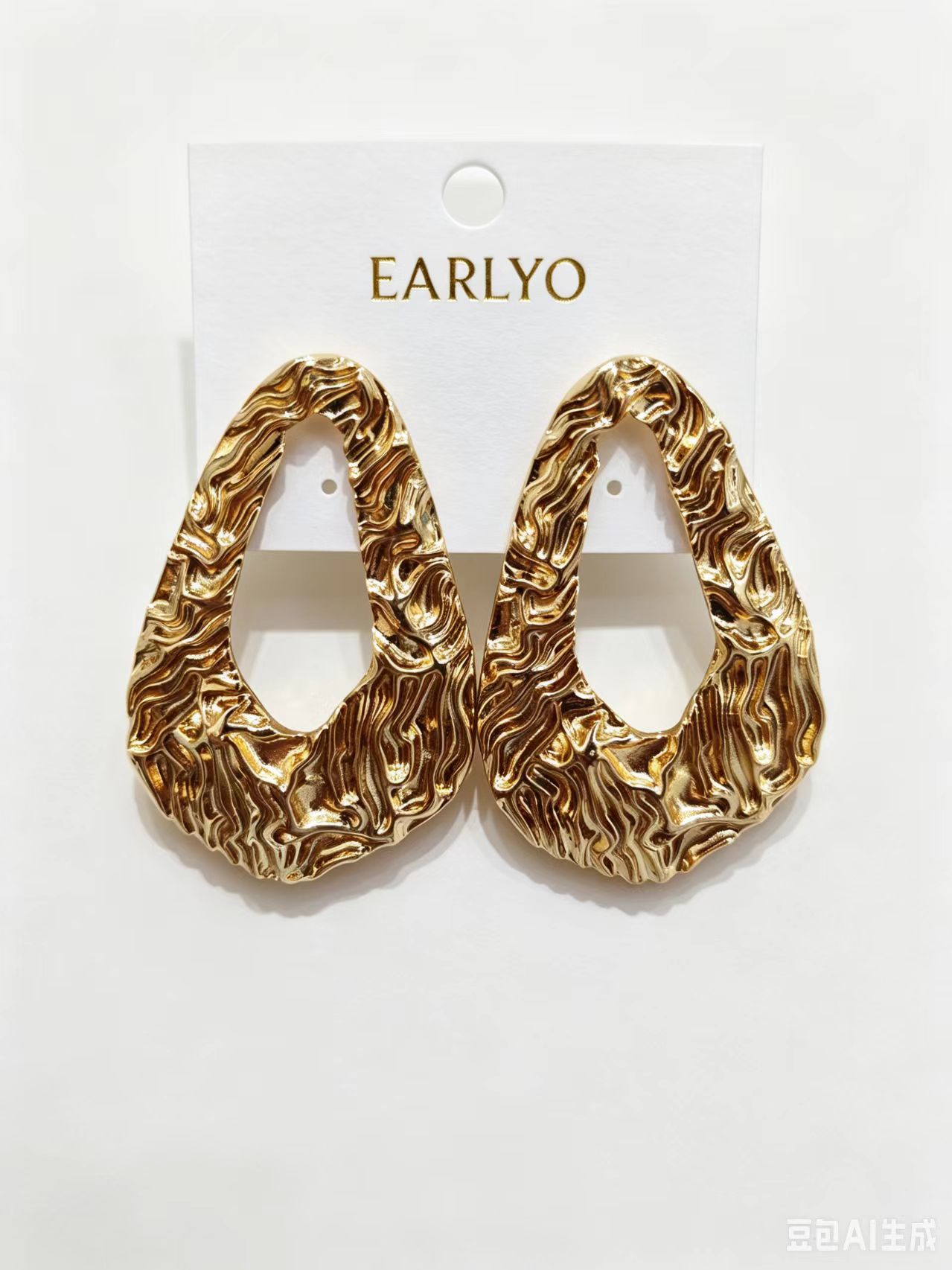 Wholesale teardrop shaped gold earrings with hammered wavy texture, fashion jewelry